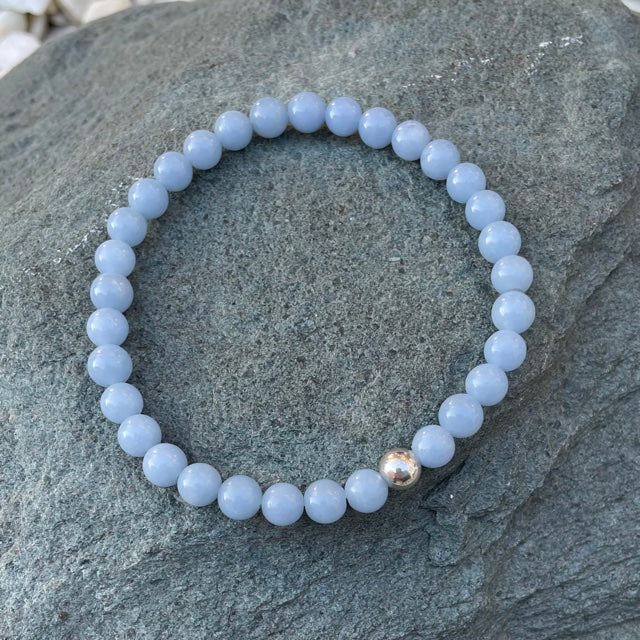 Blue crystal bracelet on stone