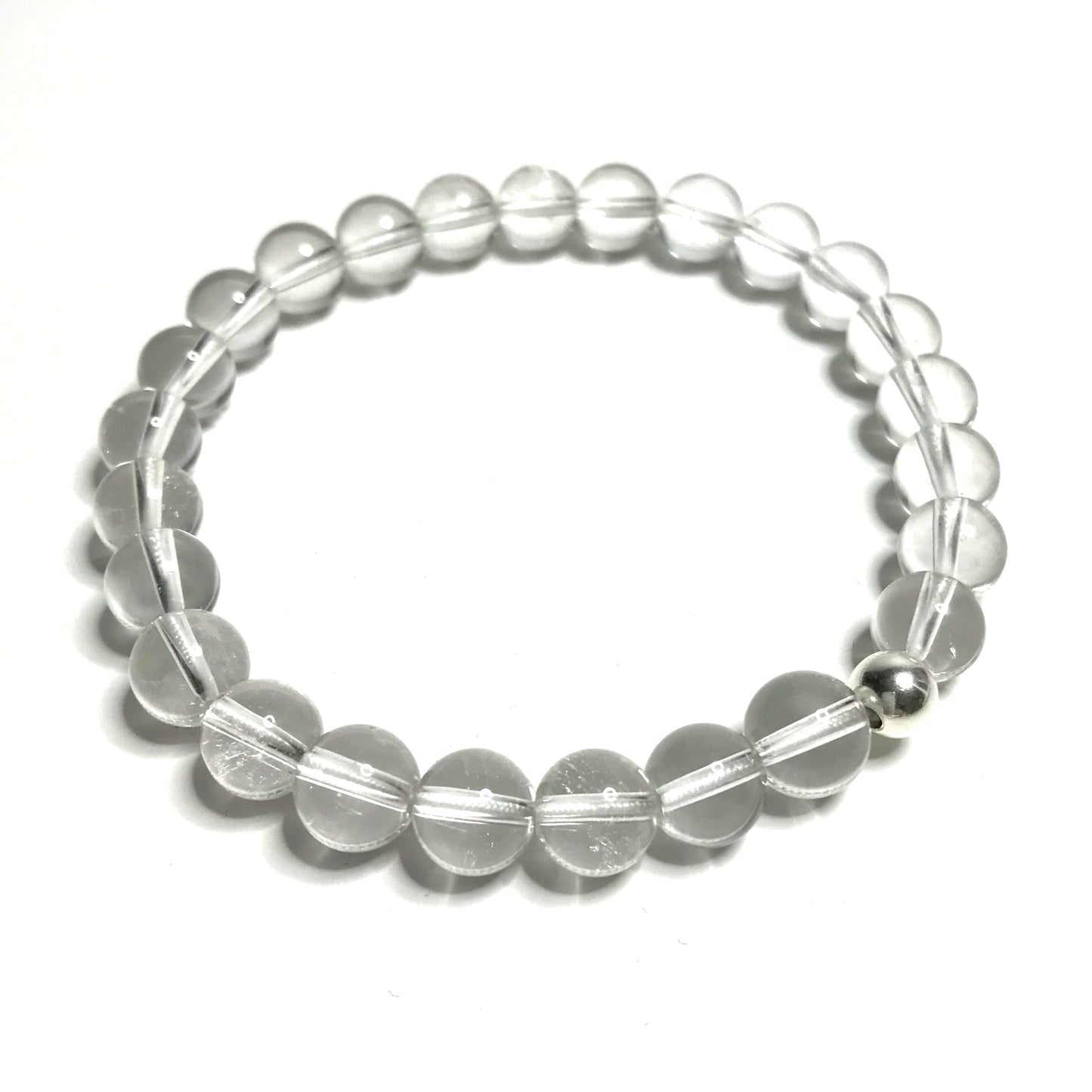 Clear quartz bracelet with sterling silver bead