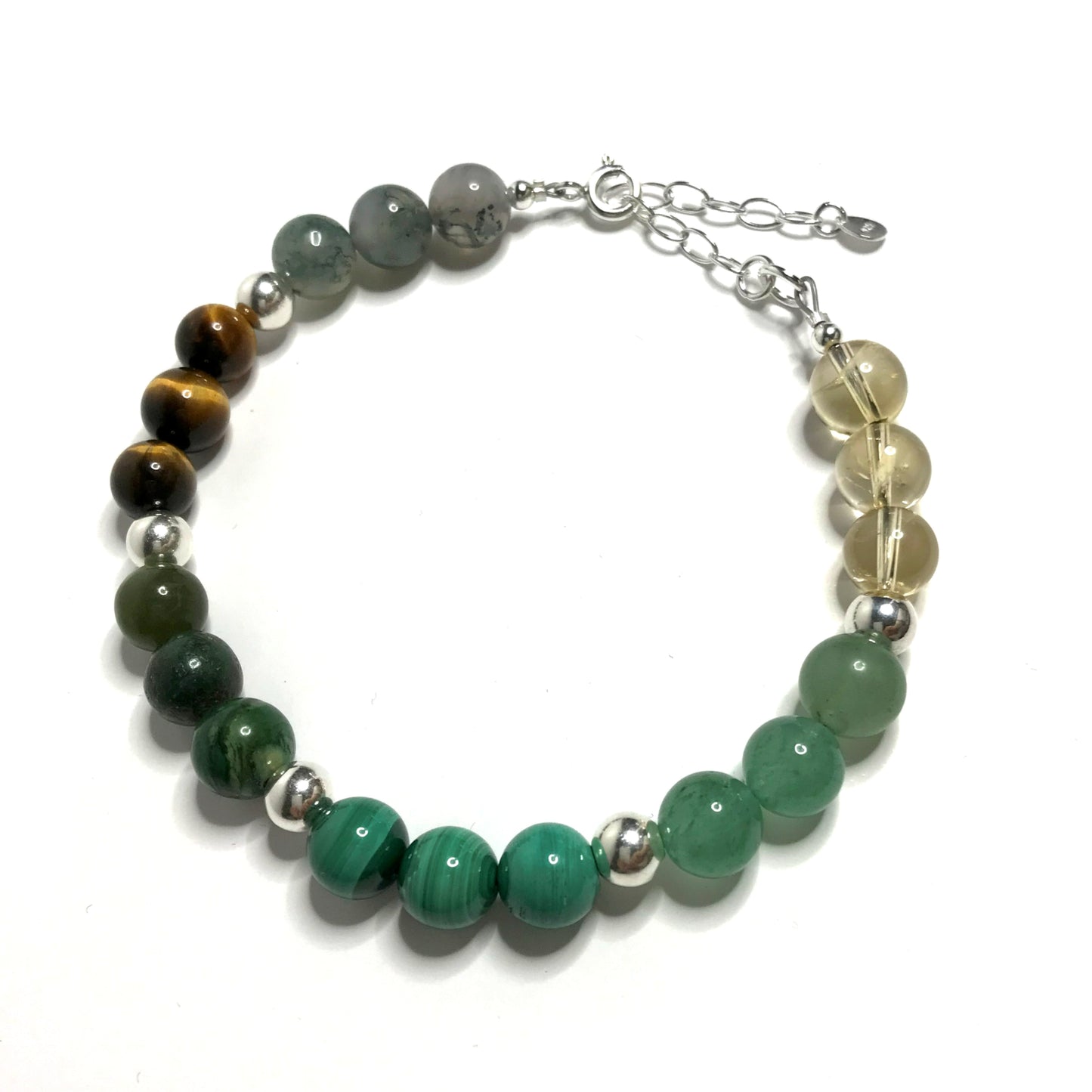 Abundance bracelet showing 6 different crystals separated by silver beads