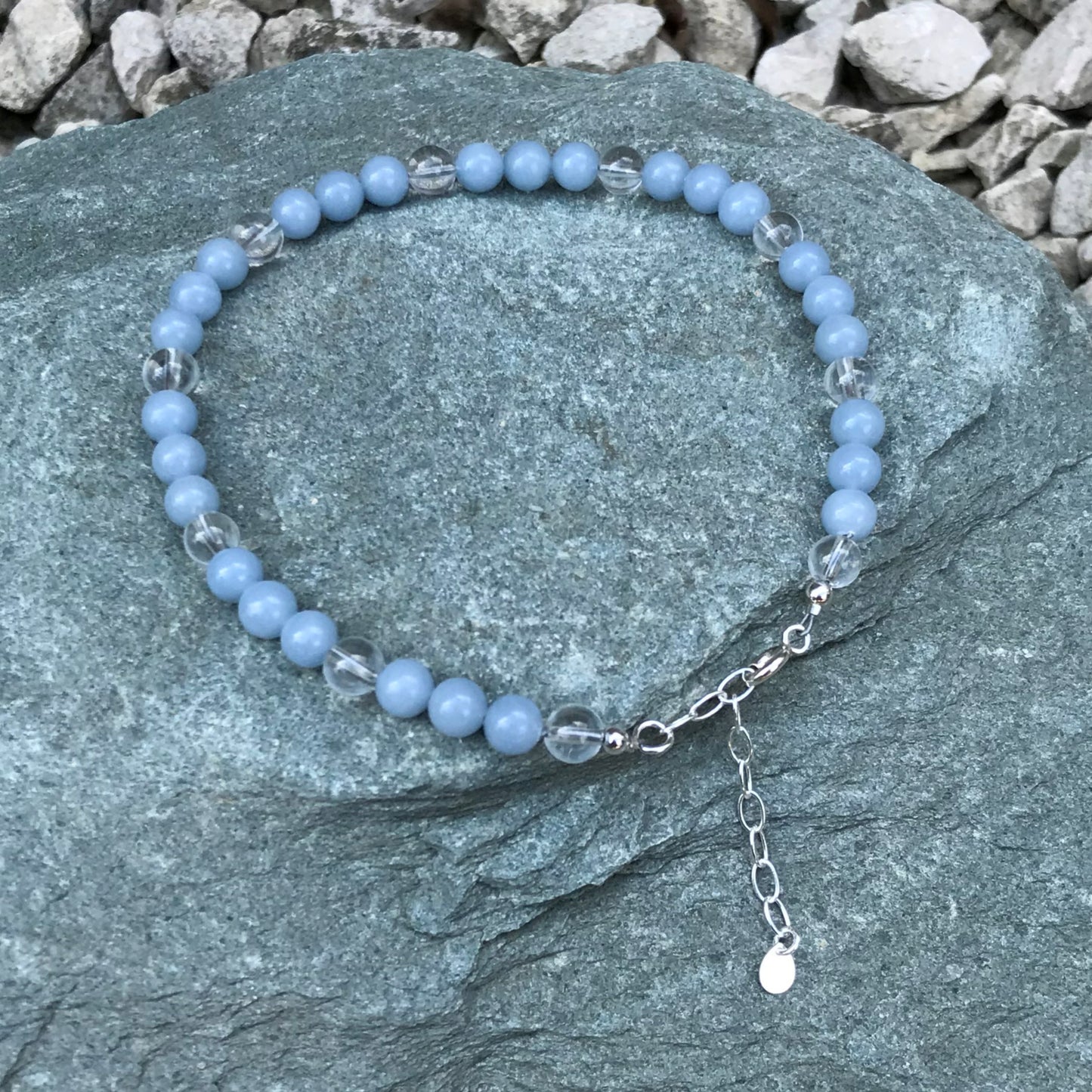 Angelite bead anklet on stone