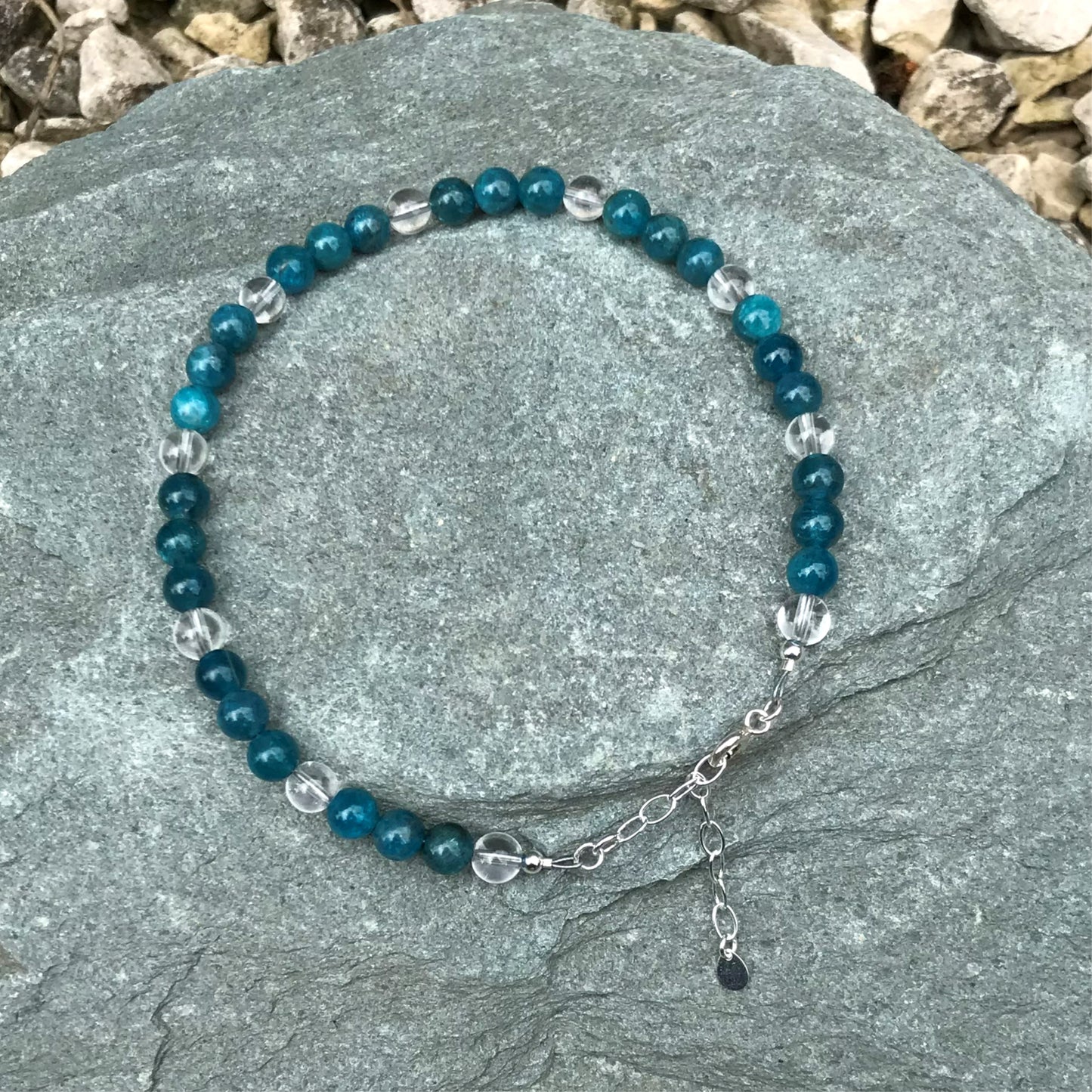 Blue crystal anklet on stone