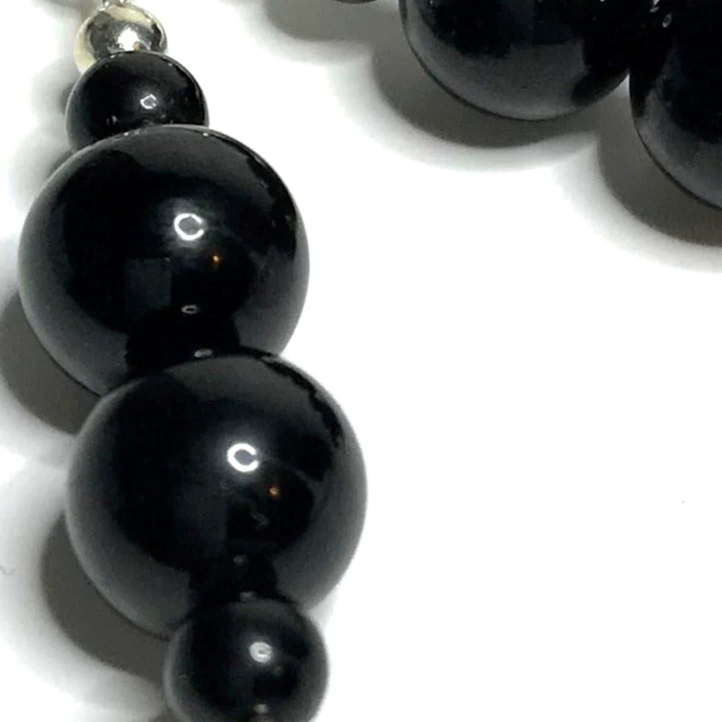 Close up of black tourmaline beads