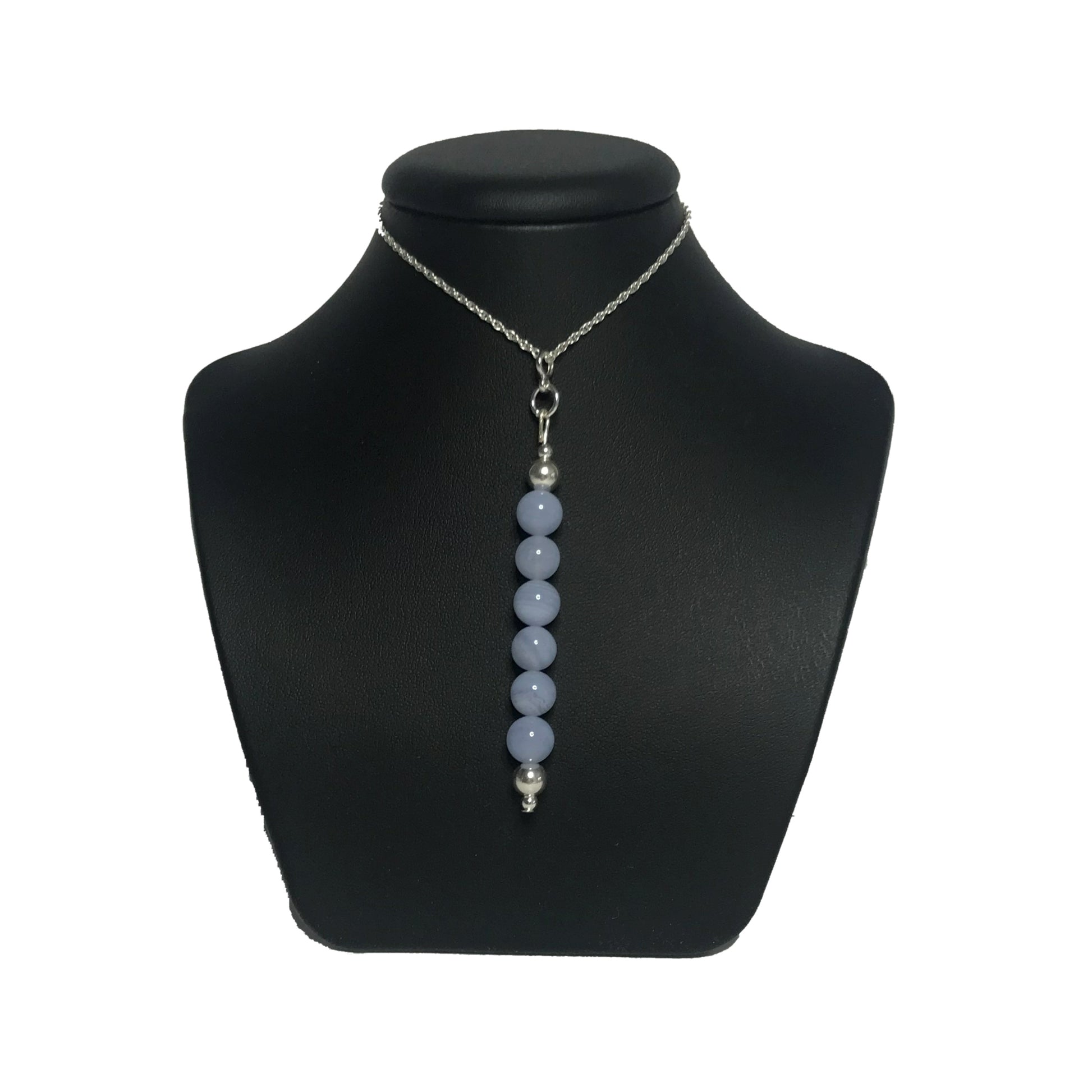 Blue lace agate pendant necklace on stand