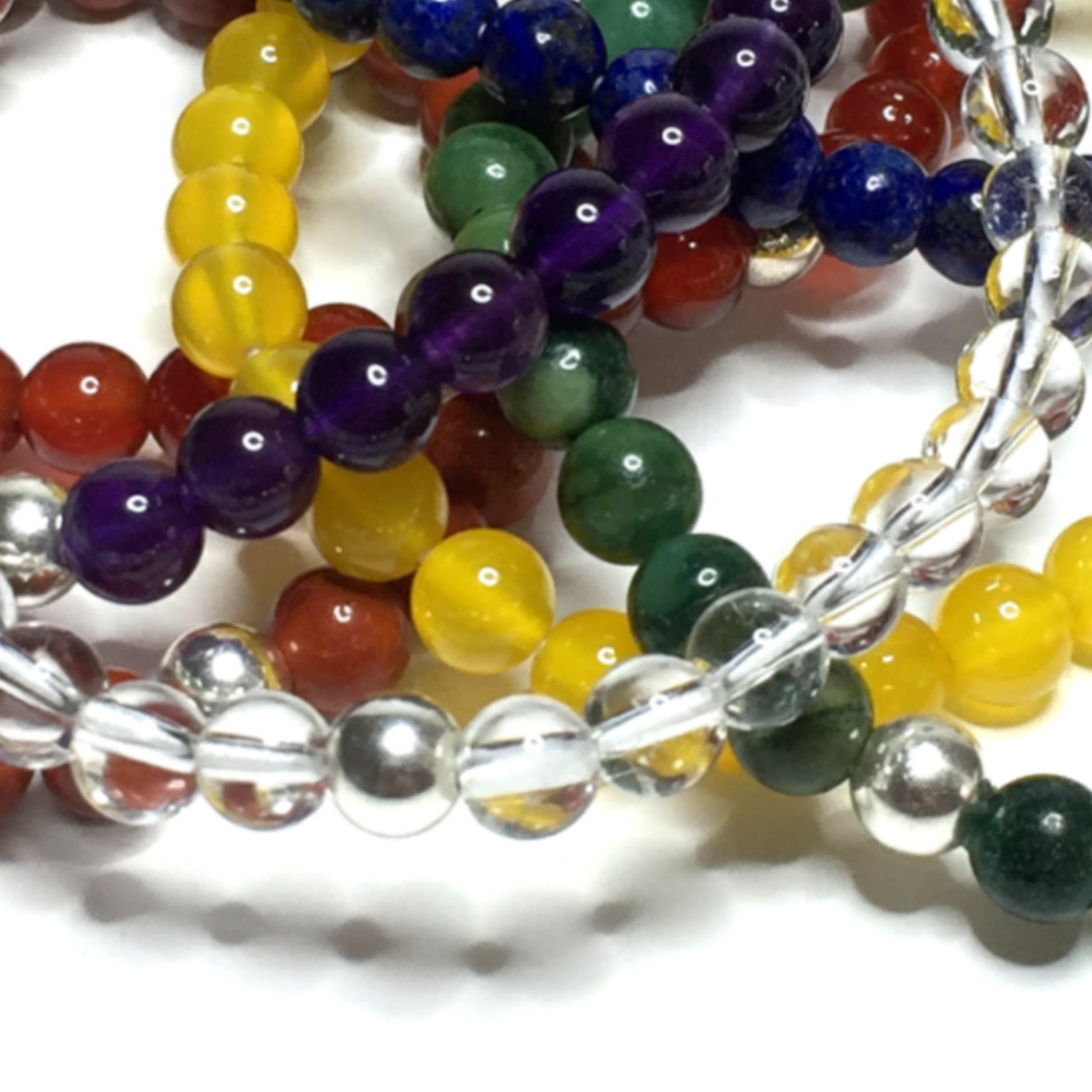 Set of seven bracelets, one for each chakra