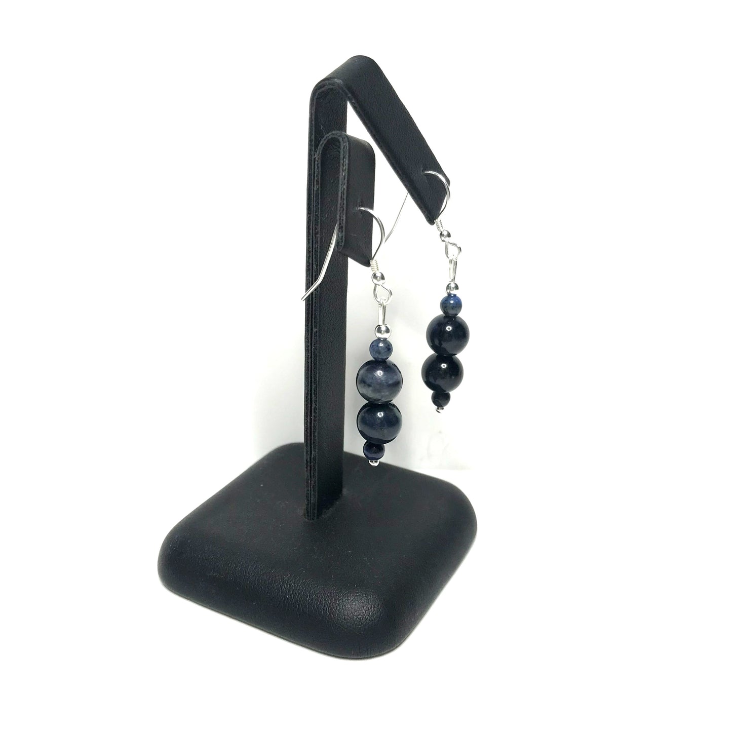 Dumortierite dangle earrings on stand