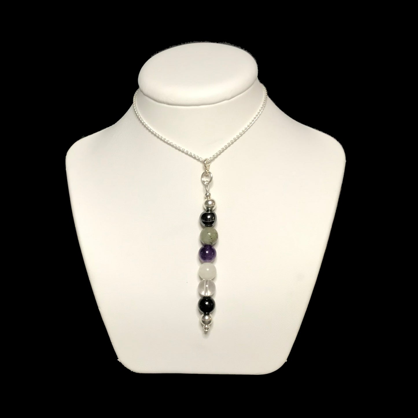 Empath proctection crystal pendant on stand