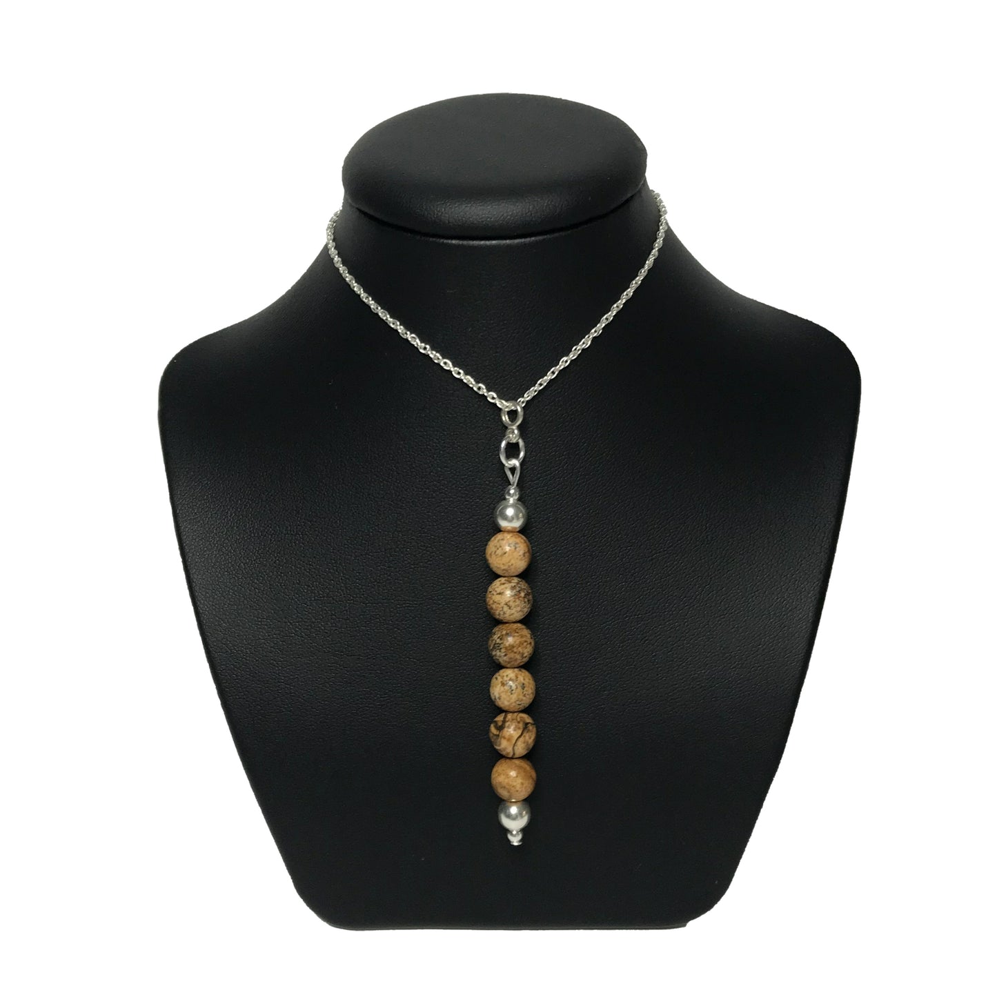 Picture jasper pendant necklace on a black stand