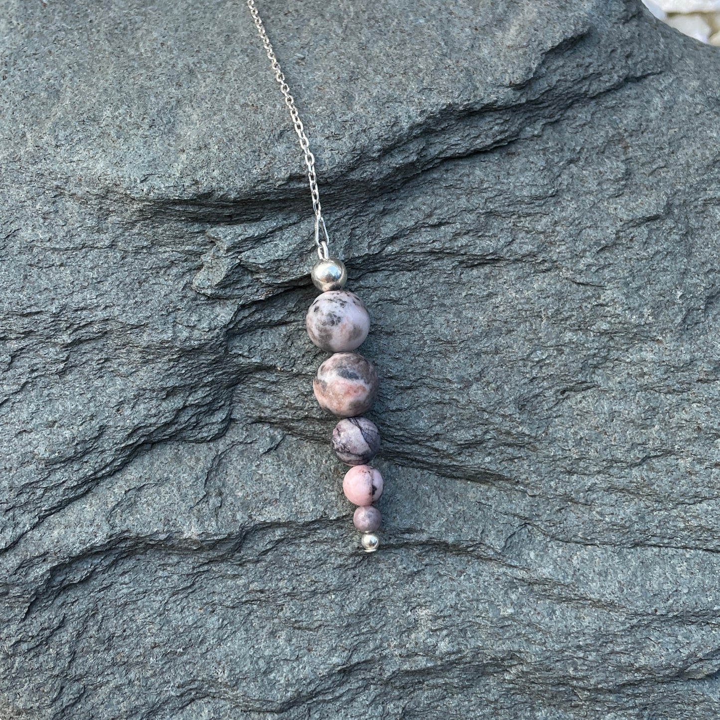 Pink zebra jasper crystal pendulum