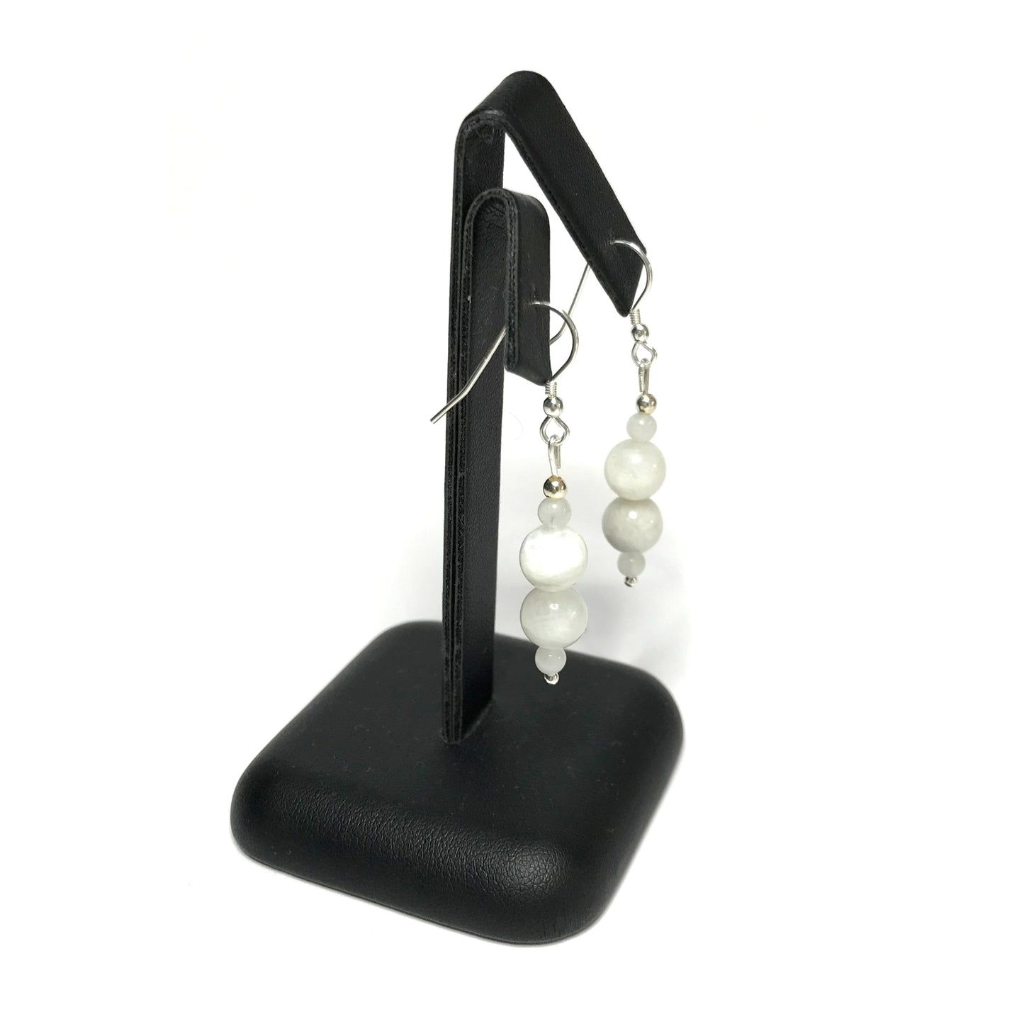 Rainbow moonstone crystal earrings on stand