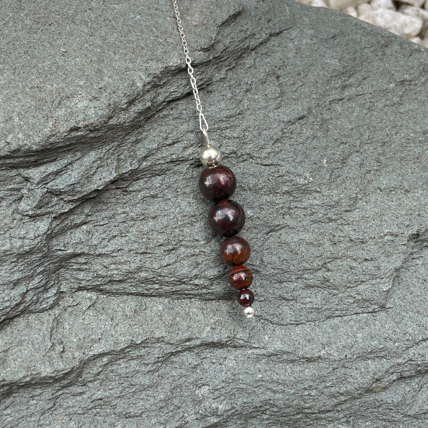 Red iron tiger's eye gemstone pendulum