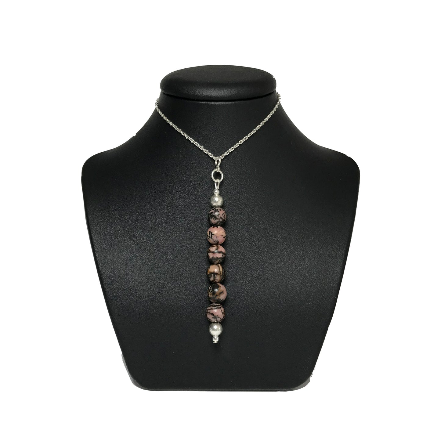 Rhodonite pendant on a stand