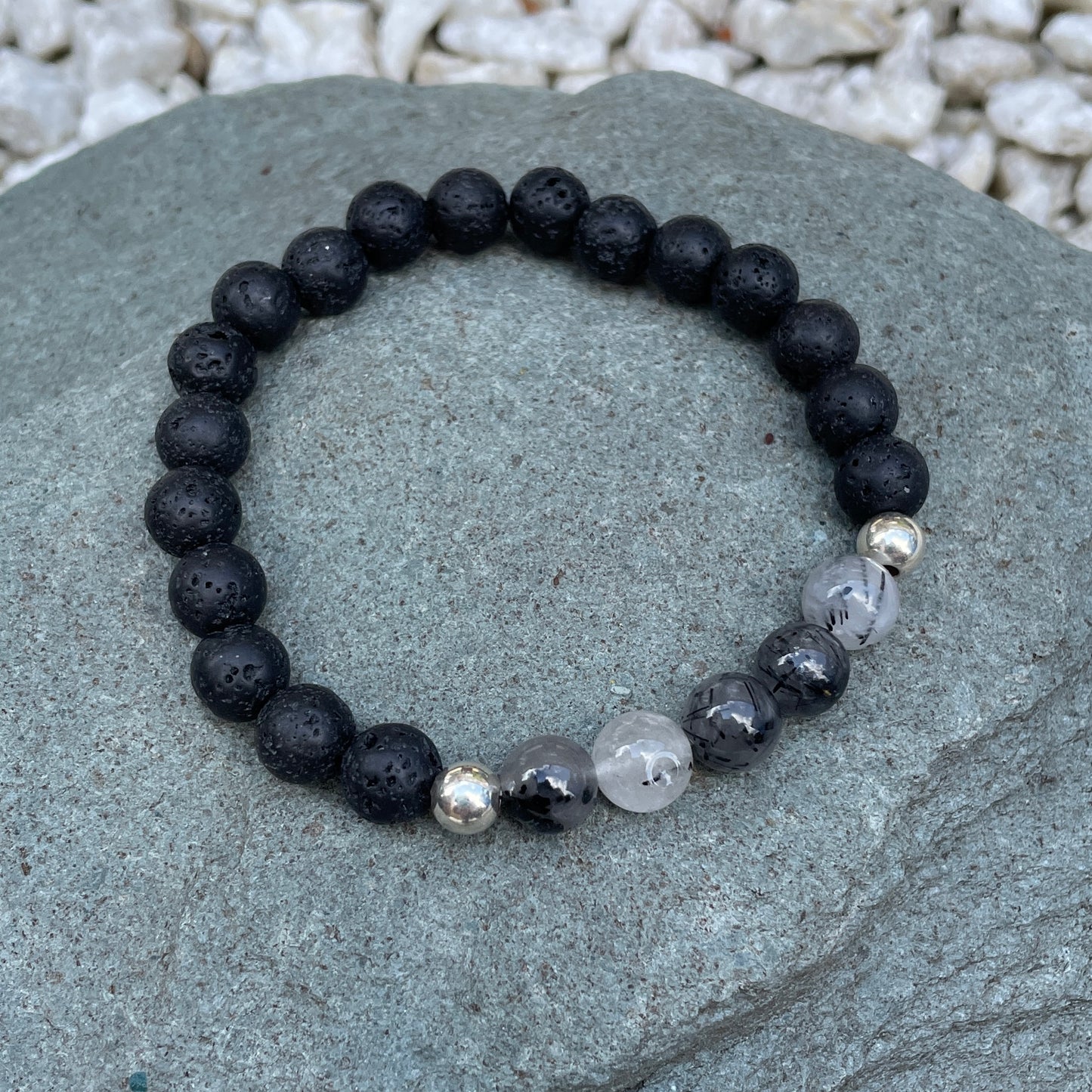 Tourmalinated quartz with lava rock crystal bracelet