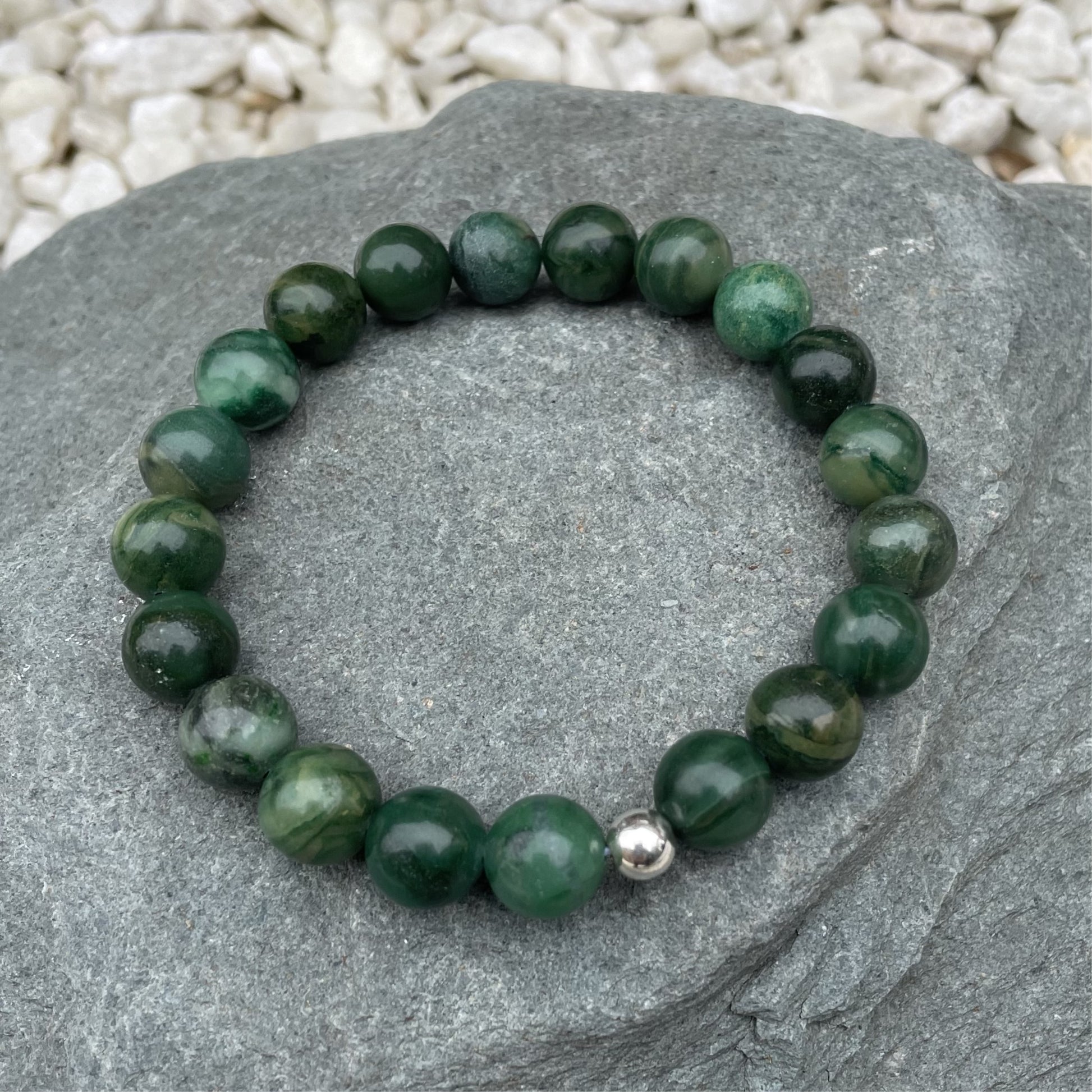 Elegant African Jade crystal bracelet completed with a silver bead.