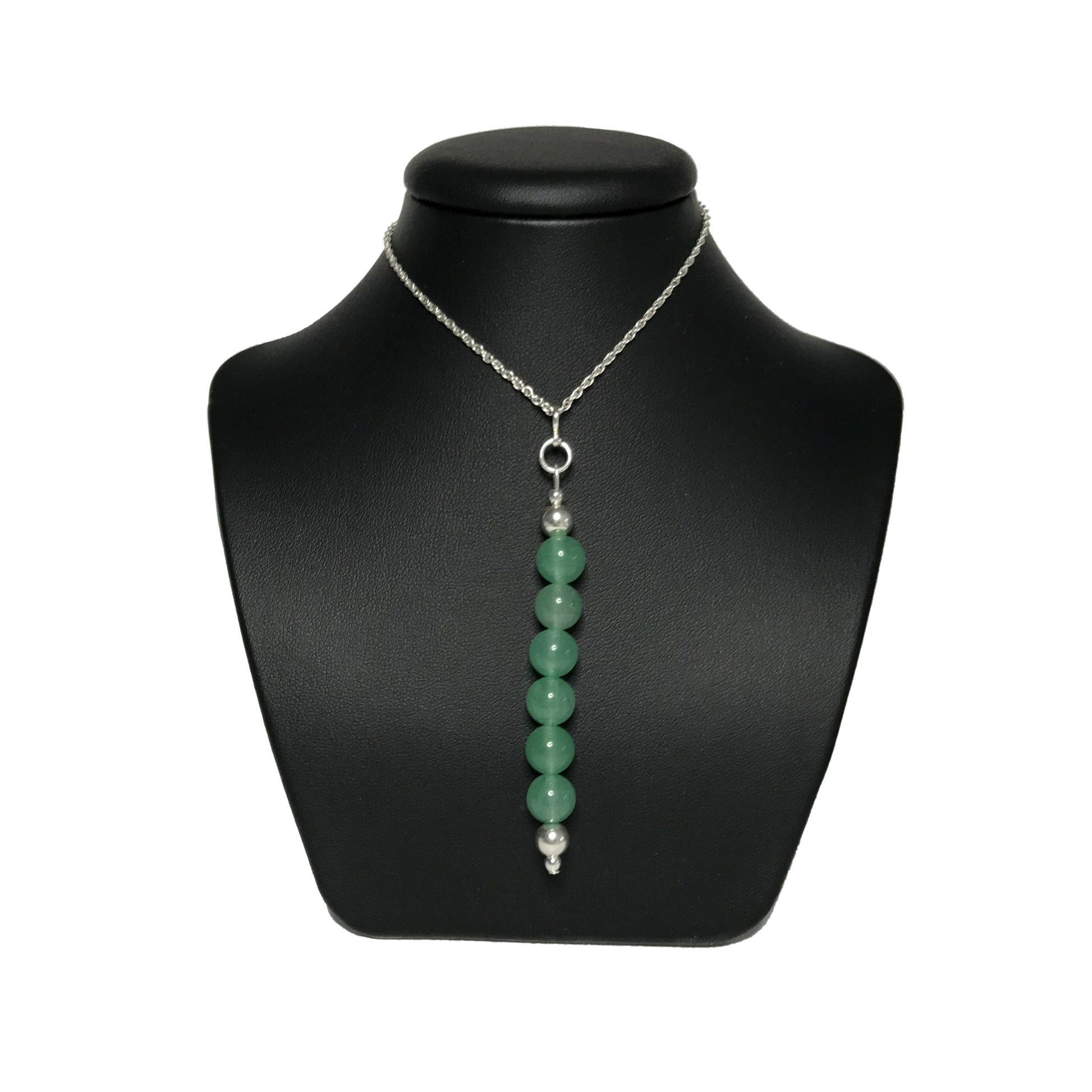 Green aventurine pendant necklace on stand