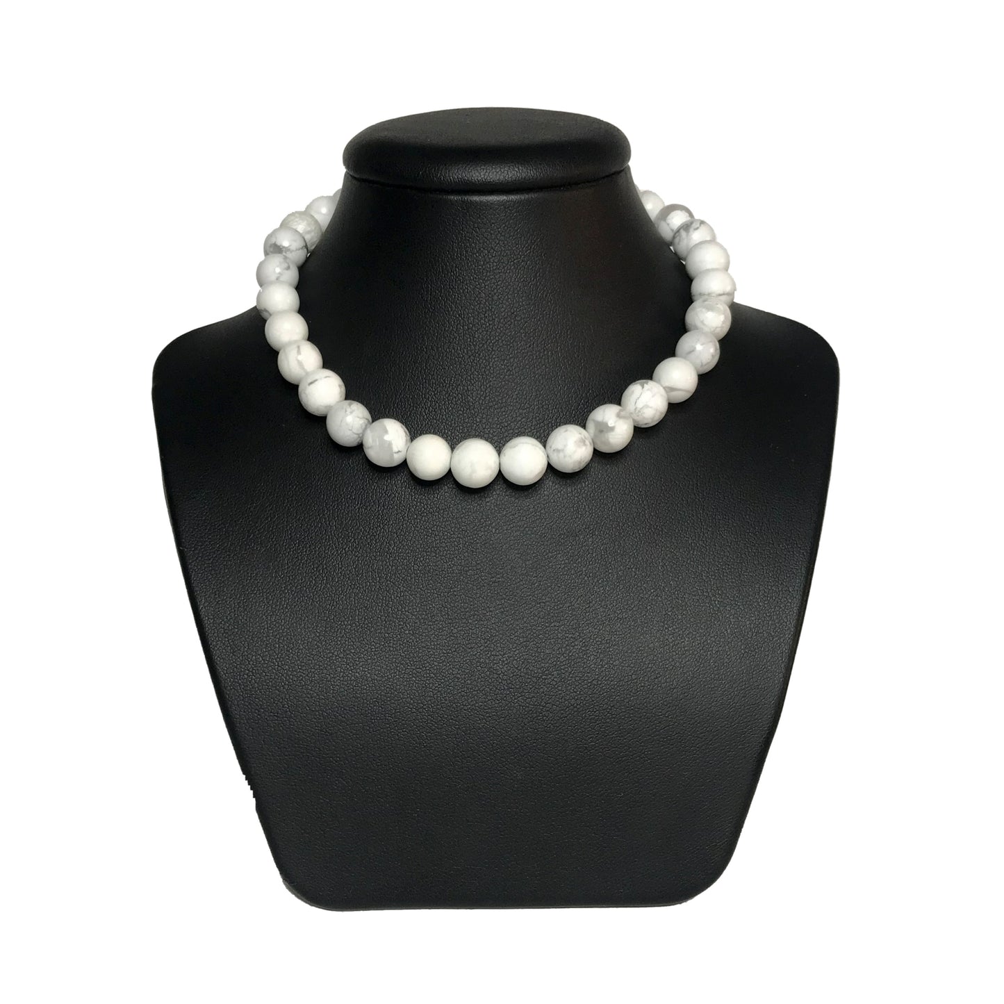 Howlite beaded necklace on stand