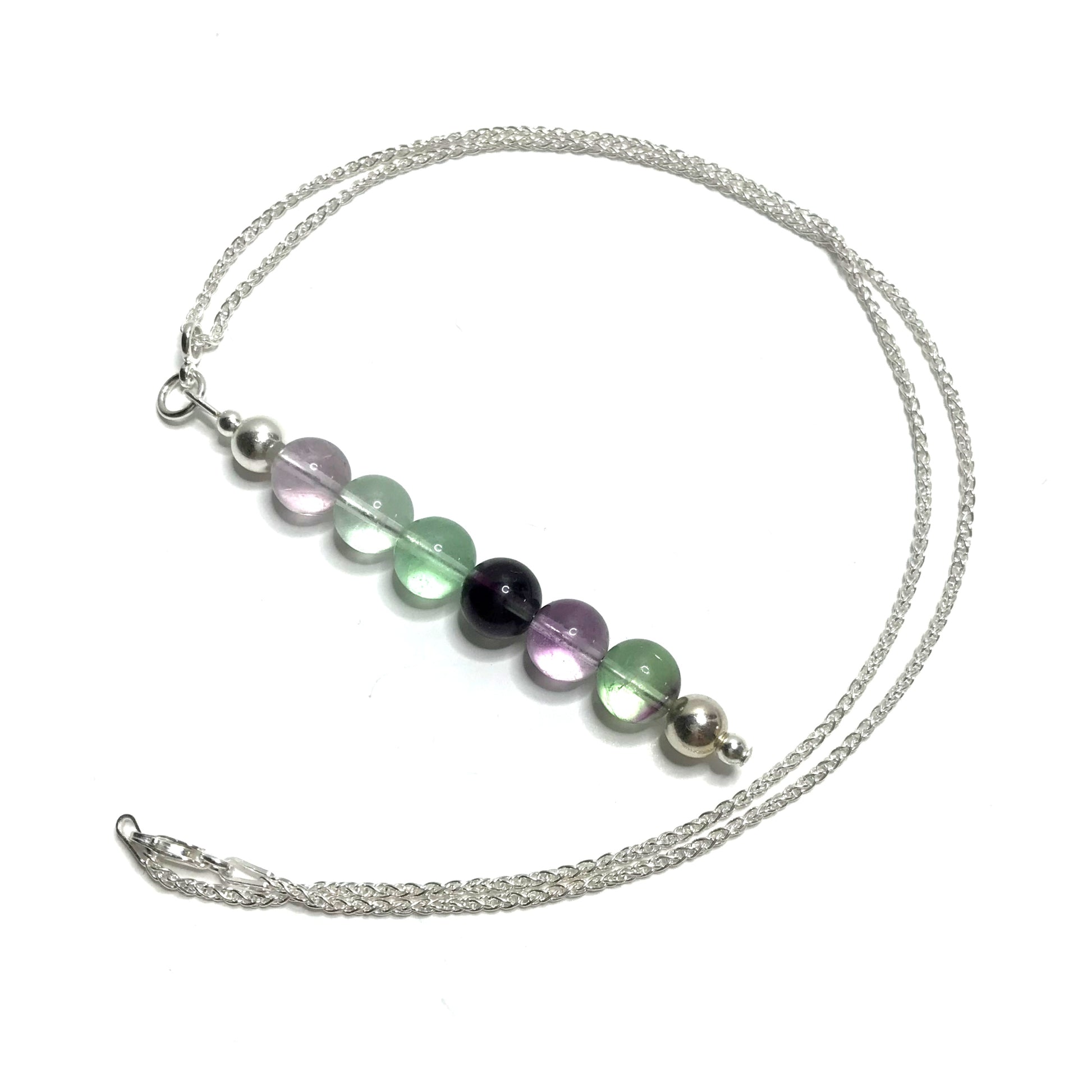 Rainbow fluorite crystal pendant on a silver chain