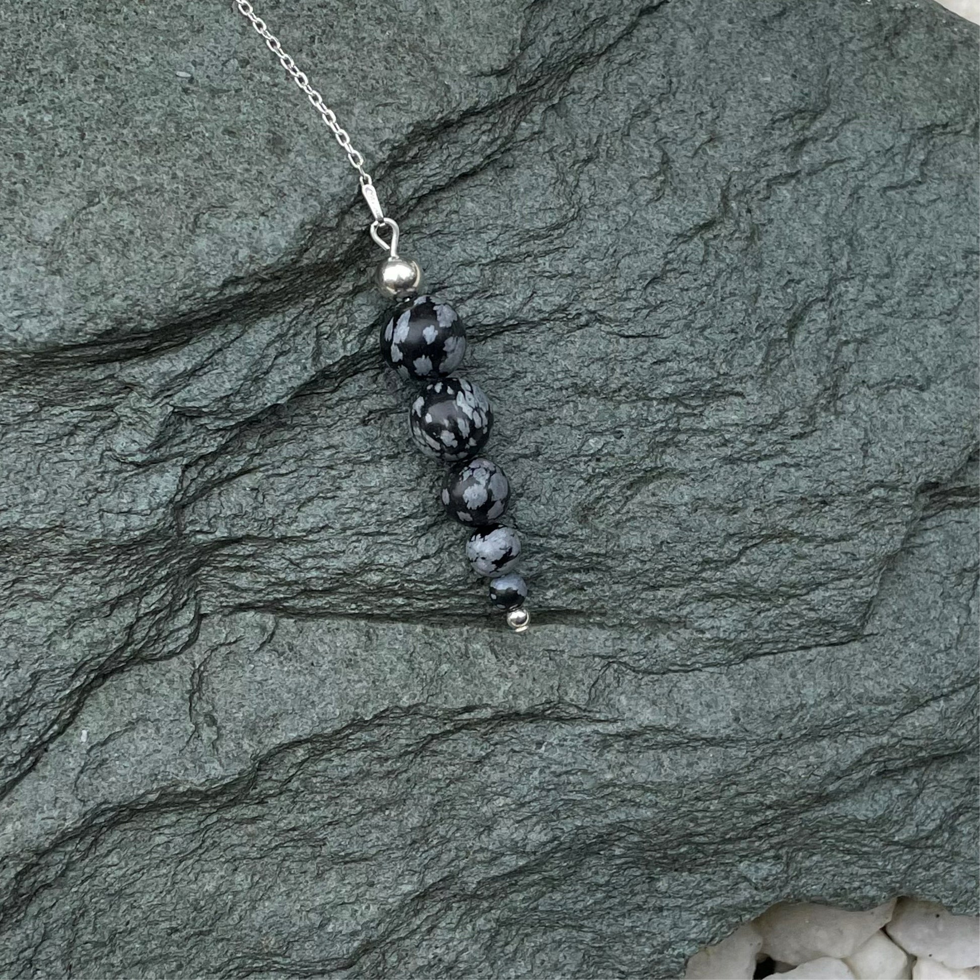 Snowflake obsidian crystal pendulum