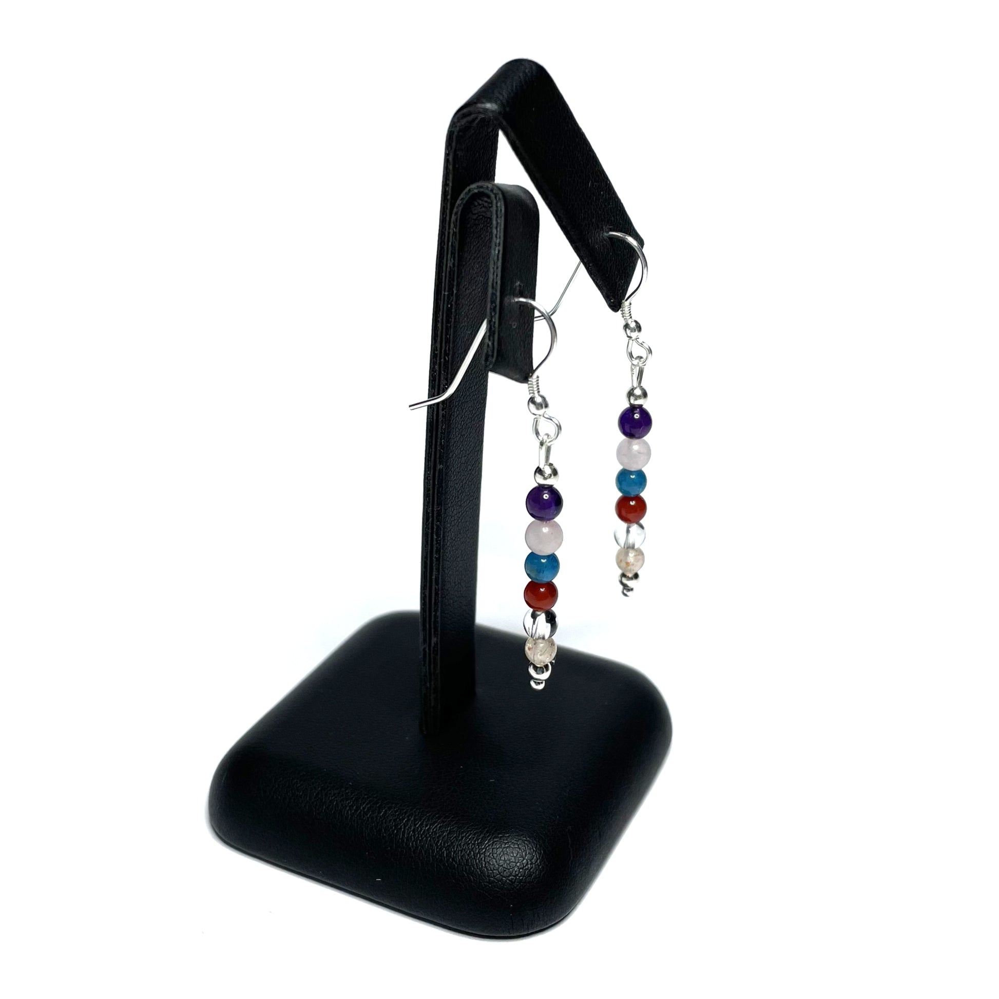 Weight loss crystal earrings on stand