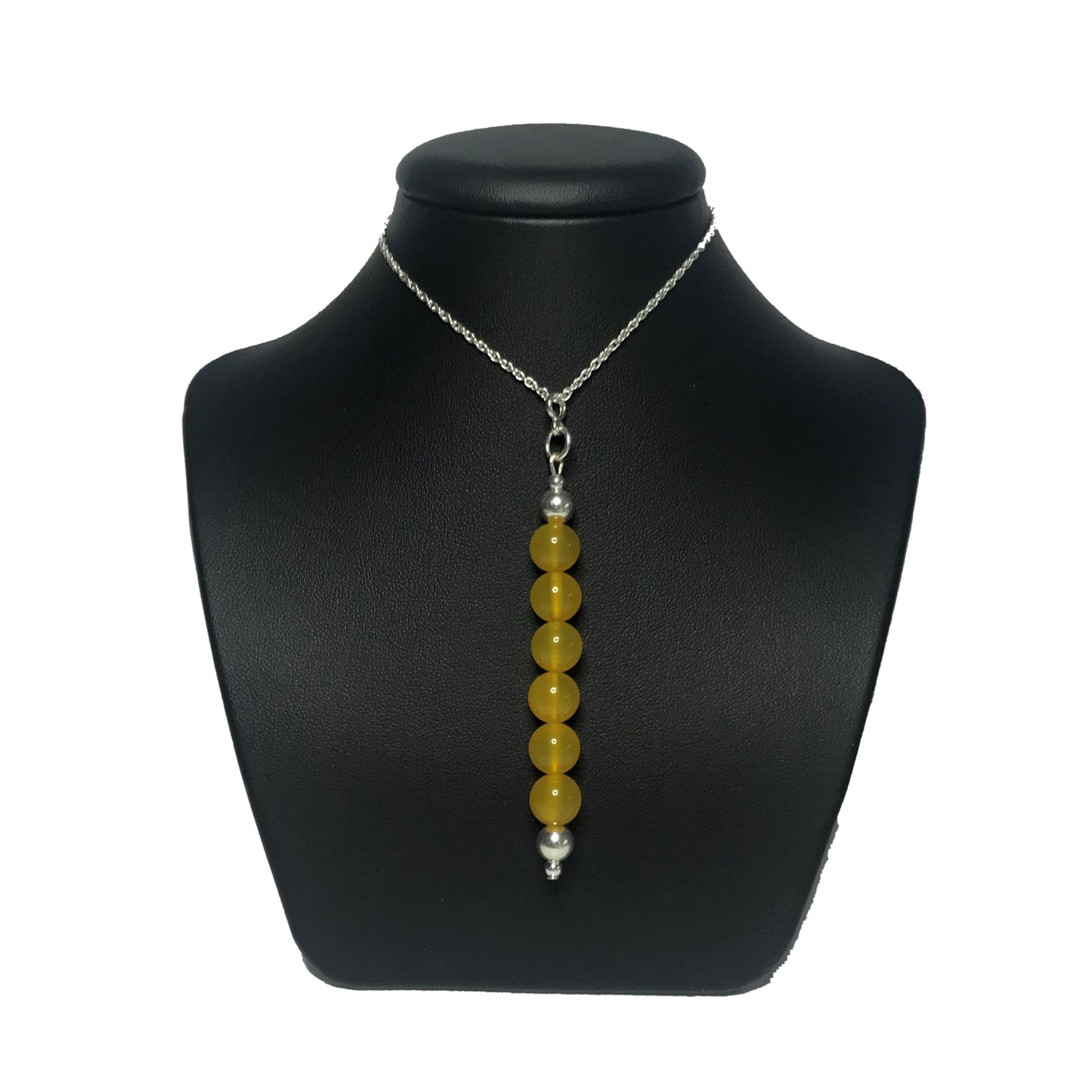 Yellow agate bead pendant on stand