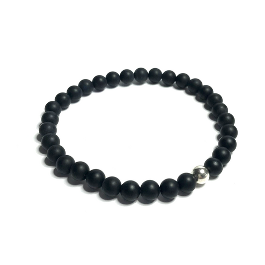 Handmade 6mm matte onyx bracelet on white background